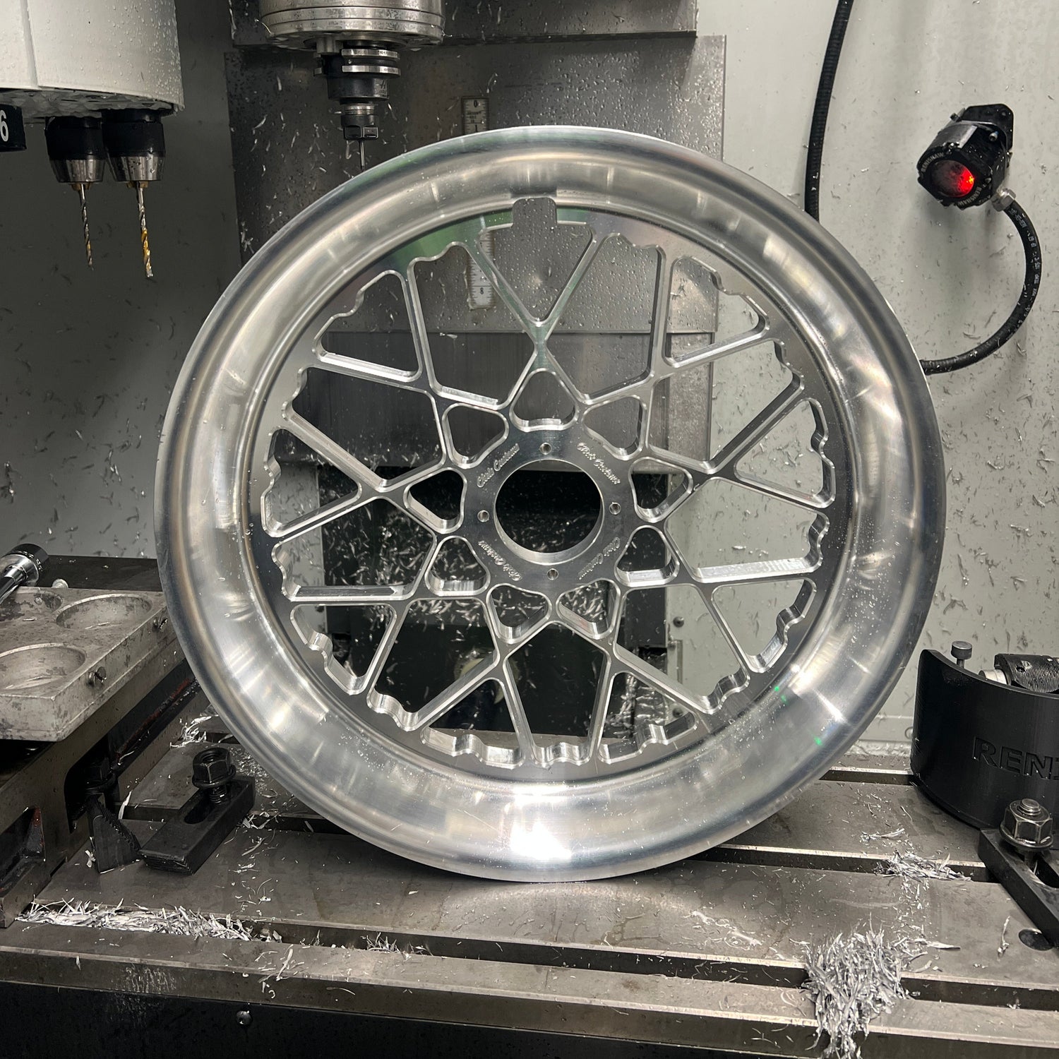 Metallic wheel rim on a lathe machine