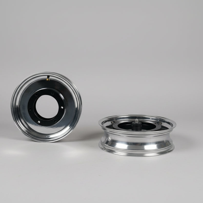 A super chrome finish front wheel for a Super73 S bike model, displayed on a car's trunk.