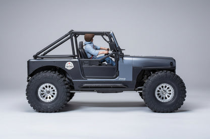 Model Jeep on a wooden surface with a neutral background