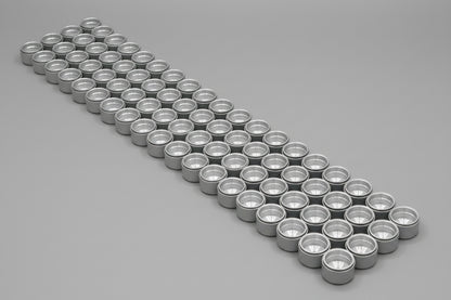 Row of metallic cylindrical objects on a gray background