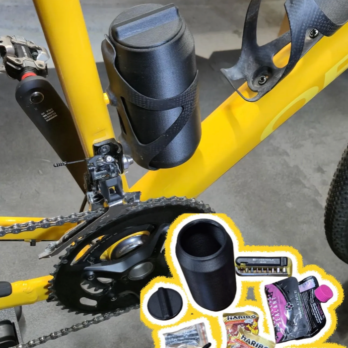 A yellow bicycle frame with a black carbon fiber water bottle cage holding a black bottle, shown alongside an inset collage of included accessories such as a bottle cap, mounting hardware, and small packaged items.
